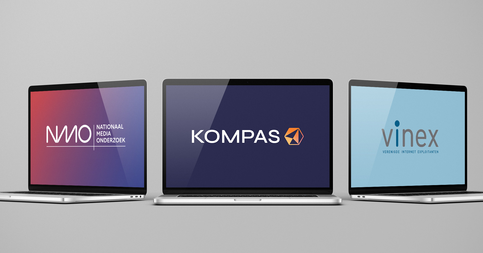 Samenwerking Kompas Publishing, NMO en VINEX getoond op laptopschermen